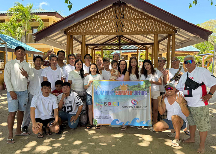 SPCI team group photo with colorful balloon backdrop